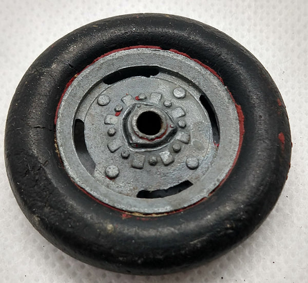 Vintage toy German car or truck wheel. 1-5/8" x 5/16" Original condition
