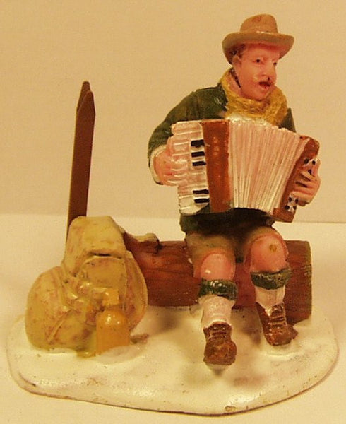 Camper playing accordian 2-1/4 in. train figures :