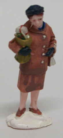 Train layout figure : Lady carrying gifts.