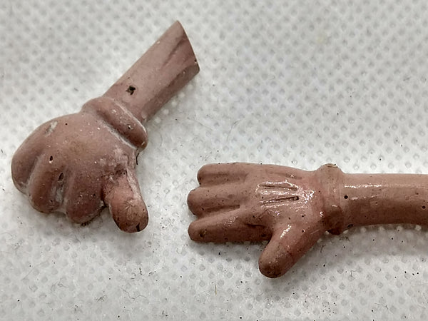 Two composition hands. Disney Toy?