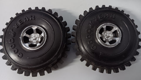 1-1/2" vintage toy racer wheels.  Two wheels are embossed Goodyear.