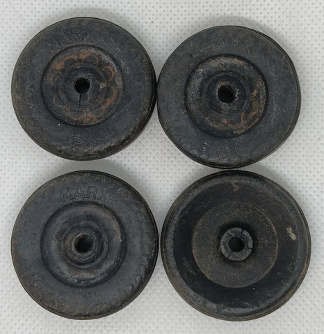 Set of 4 original Marx wheels.  Embossed Marx toys 1-5/8" x 5/16"