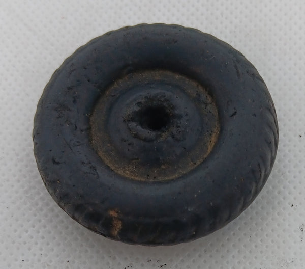 Original bakelite vintage toy truck wheels.  original condition.  1-7/8" Different size axle holes?