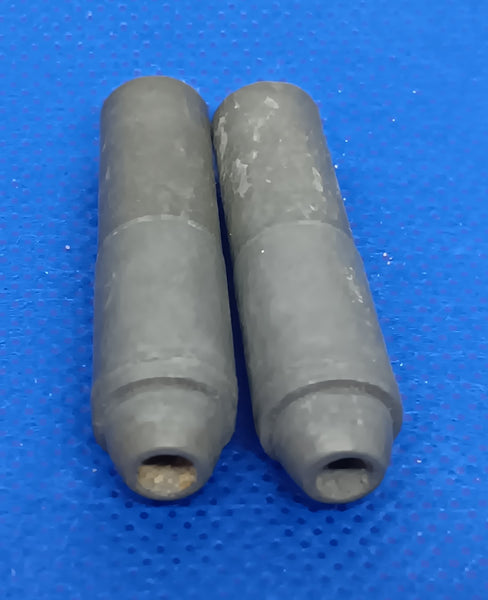 Vintage toy bullet shells Cast metal. x2