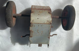 Friction motor with axle and wheels.
