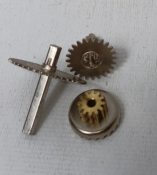 Lot of gears and spring. 3 Pieces