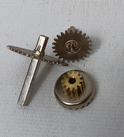 Lot of gears and spring. 3 Pieces