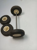 Andy Gard tires :  Super Cushion Lot of 4 tires with hubs & 3" axle. As is condition original