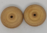 Two original 1-1/2" Cream wheels.  Hard rubber.