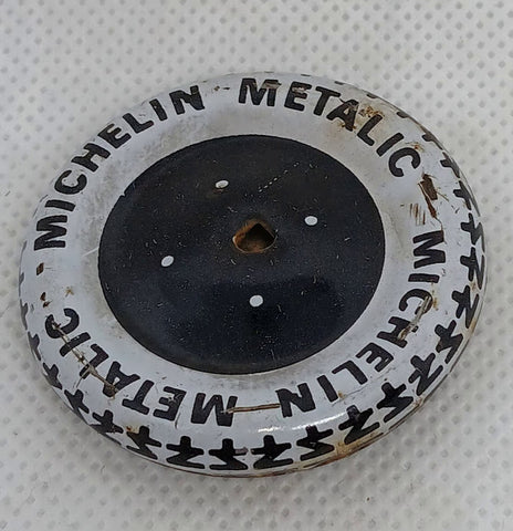 Vintage toy original tin wheel. 1-11/16" Marked Michelin Metallic
