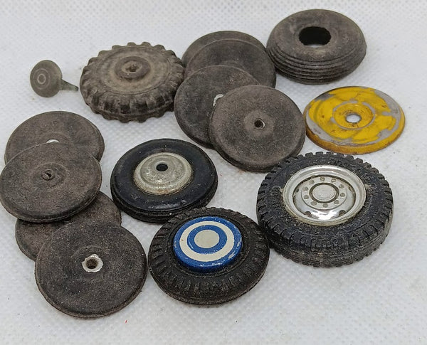 Lot of original toy wheels and hubs.  Various makes and sizes.