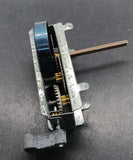 Vintage toy clockwork movement :  motor for spinning motion.  Torsion Spring