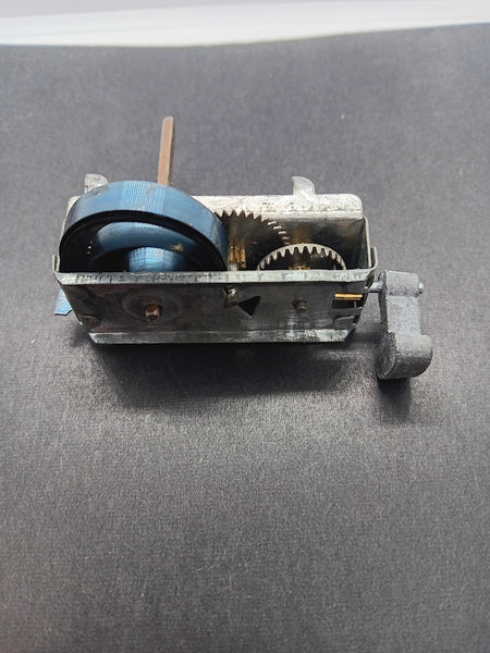 Vintage toy clockwork movement :  motor for spinning motion.  Torsion Spring