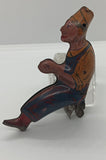 Early Marx Tinplate Tractor driver with clip.  Original. 3-1/2"