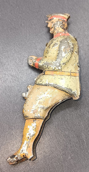 Original Early tinplate toy driver 3-1/2"