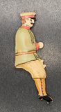 Early tinplate toy driver handpainted.