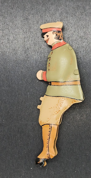 Early tinplate toy driver handpainted.