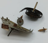 Vintage toy windup with spring and gears parts.