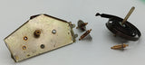 Vintage toy windup with spring and gears parts.