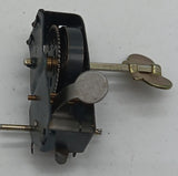 windup motor with spring and key.  Axle for wheels.