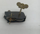 windup motor with spring and key.  Axle for wheels.