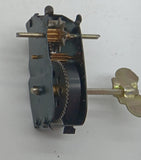 windup motor with spring and key.  Axle for wheels.