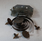 Vintage toy motor with spring and gears