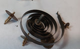 Vintage toy motor with spring and gears