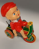 Tin windup toy boy on trike.  parts only.  windup works