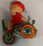 Tin windup toy boy on trike.  parts only.  windup works
