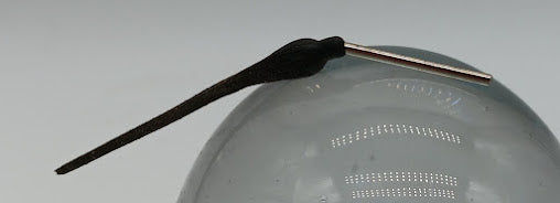 Vintage toy tail on post.  2-1/4" plus 1" post.