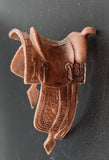 Western style toy horse saddle : Marx Hartland?  3-1/4" x 1-3/4"