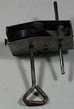 Vintage toy clockwork car motor with key and governor.