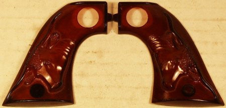 Hubley capgun Dark Amber Grips with long horn steer detail. 3"