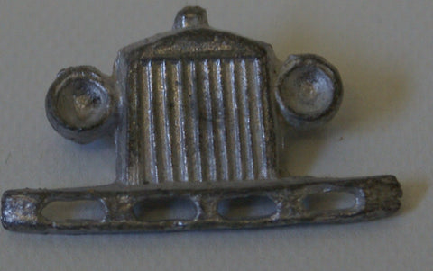 Tootsie Toy Diecast headlight and bumper. Grill is 1-1/4" Height is 6/8"