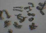 Lot of diecast parts. Britains Ltd. Soldier arms, wheels 20+ pieces