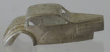 Diecast car body.  Silver cast metal.