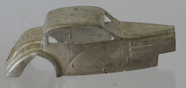 Diecast car body.  Silver cast metal.