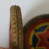 1-1/2" Tin Litho wheels with tire. Made in Japan, original condition