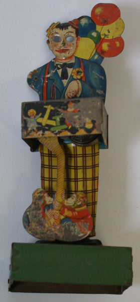 Ketterman Balloon Seller tin toy part.