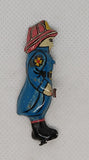 Vintage tin toy fireman figure  (one side only)