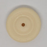 Vintage toy 1-1/8" wheel.  Hard plastic.  Black or Cream