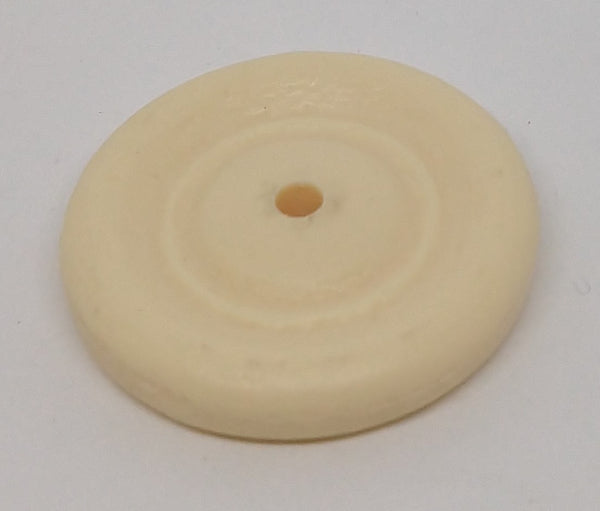 Vintage toy 1-1/8" wheel.  Hard plastic.  Black or Cream