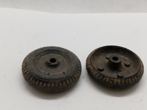 Two original plastic wheels 1-1/4"