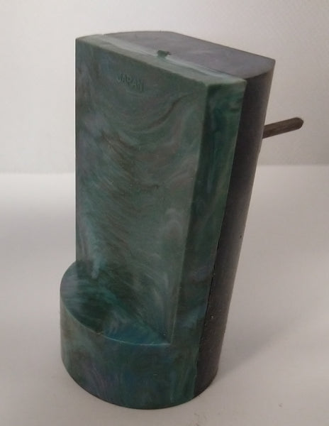 Vintage toy windup motor to make toy spin. Sealed unit with windup.