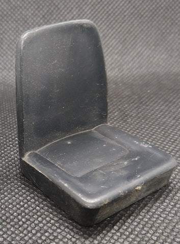 Toy car or truck original seat. Black plastic.