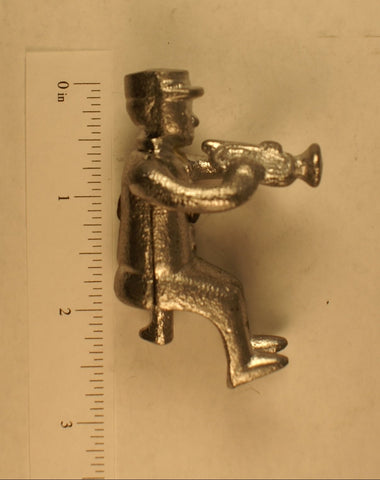 Cast Figure playing trumpet :